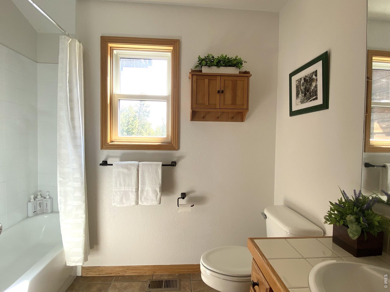 28 Valley View Lane Evergreen, CO 80439 - Photo 25 of 37 a bathroom with a sink toilet and tub