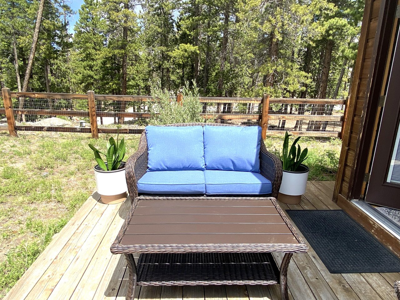 28 Valley View Lane Evergreen, CO 80439 - Photo 28 of 37 a view of a balcony with chairs