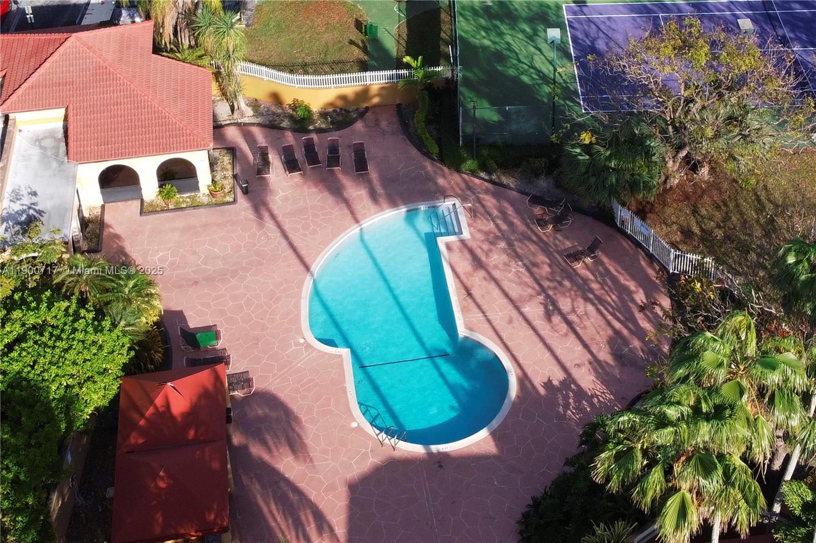 15520 Southwest 80th Street, Unit B301 Miami, FL 33193 - Photo 22 of 25 an aerial view of a house with swimming pool and outdoor seating