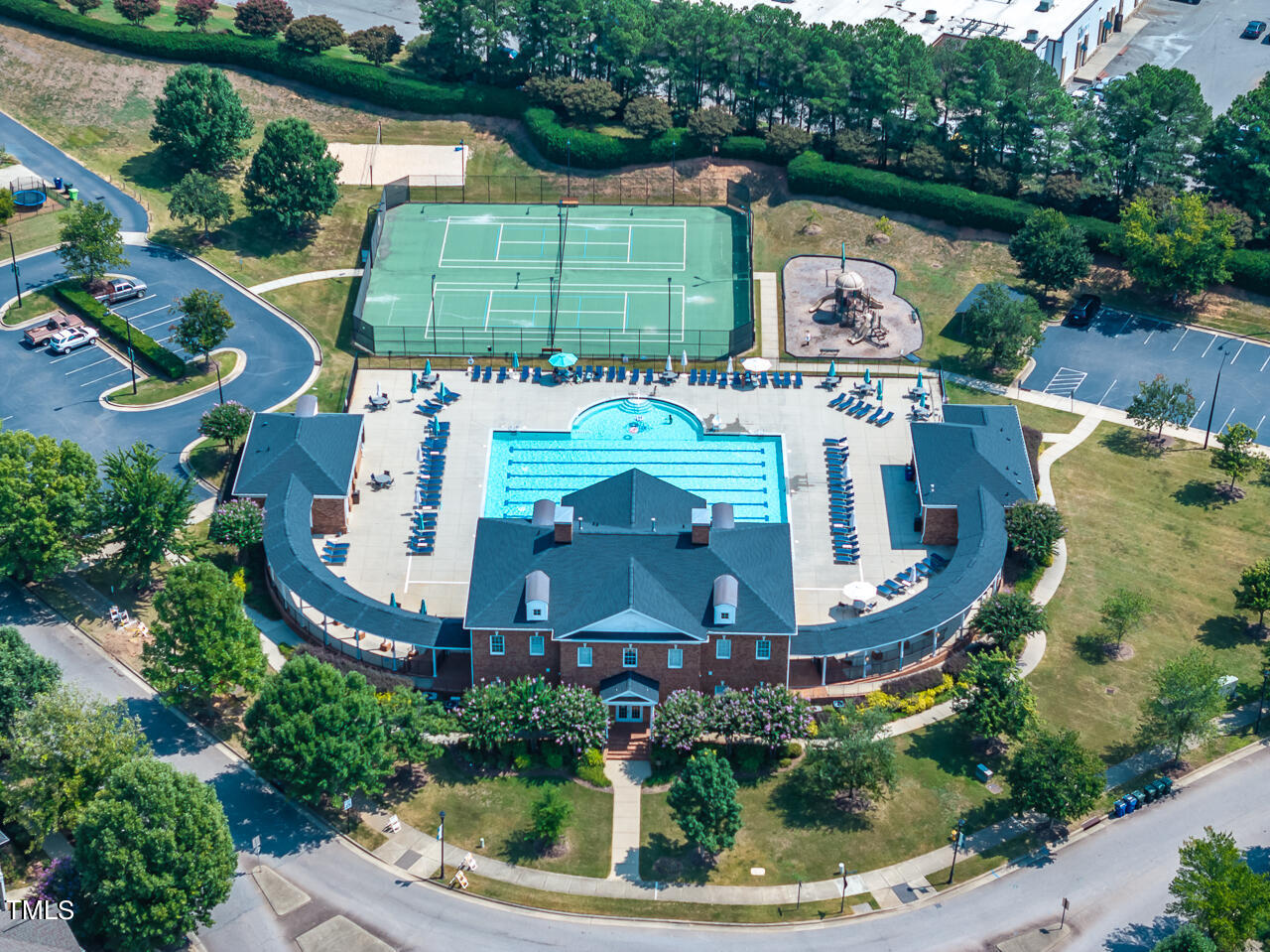 920 Chapanoke Road Raleigh, NC 27603 - Photo 38 of 47 an aerial view of a house with a garden and lake view