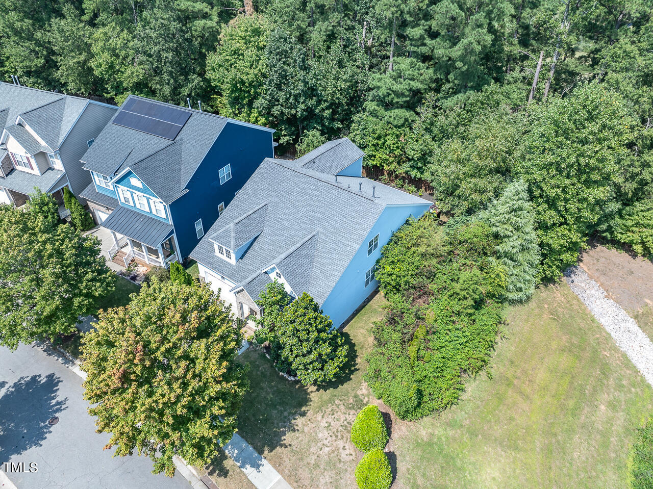 920 Chapanoke Road Raleigh, NC 27603 - Photo 40 of 47 an aerial view of a house with a yard and garden