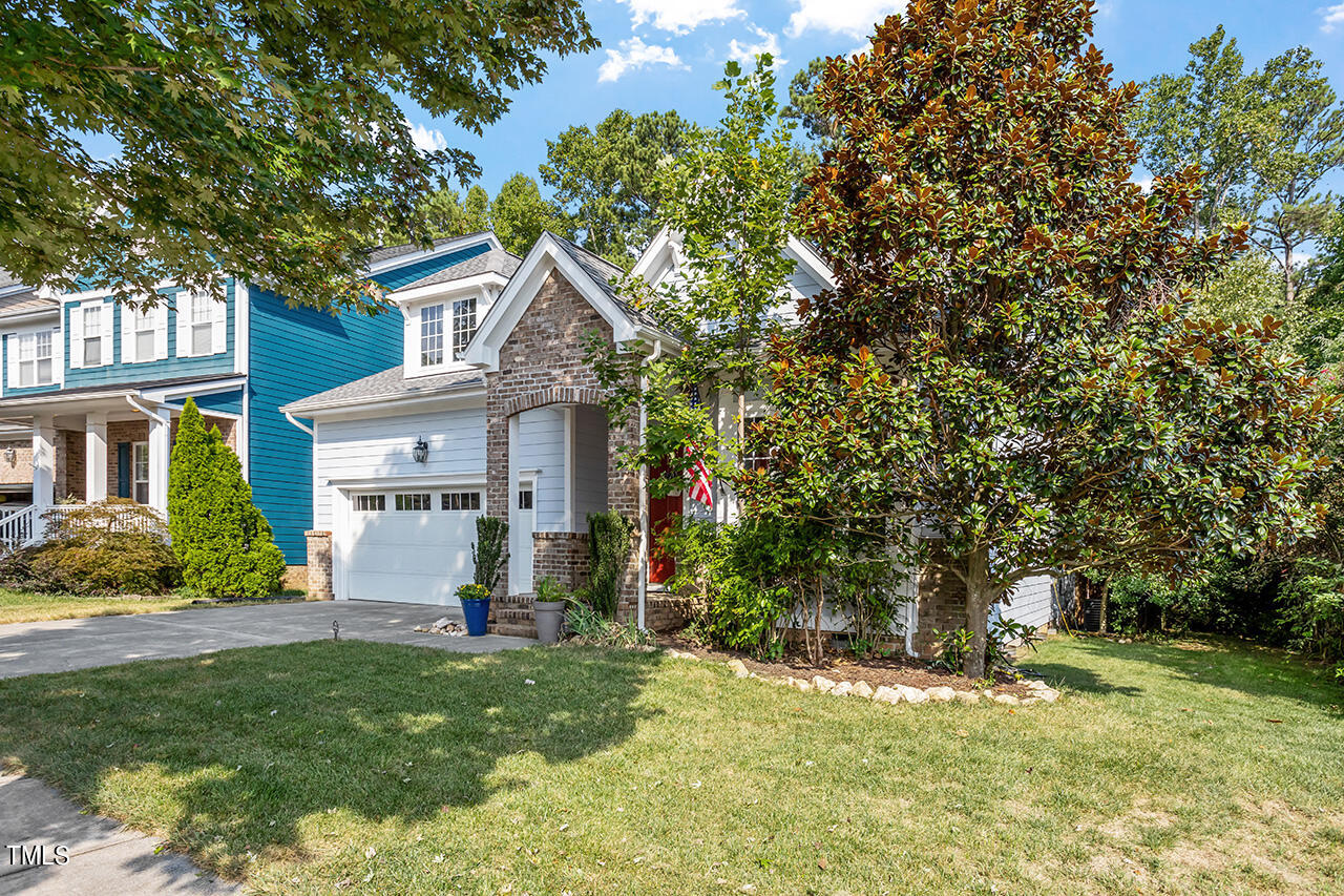 920 Chapanoke Road Raleigh, NC 27603 - Photo 44 of 47 a view of a house with a yard