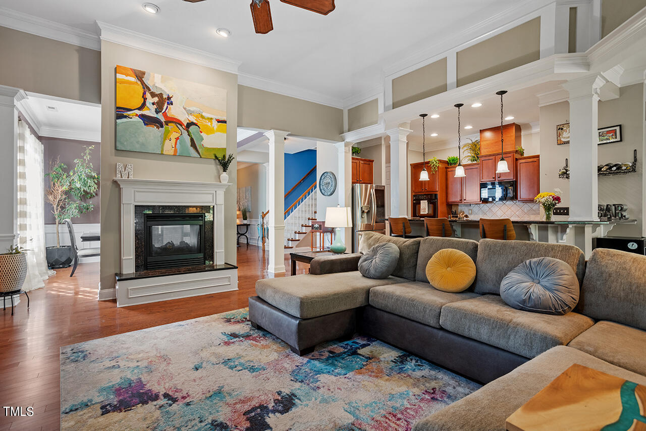 920 Chapanoke Road Raleigh, NC 27603 - Photo 9 of 47 a living room with furniture and a fireplace