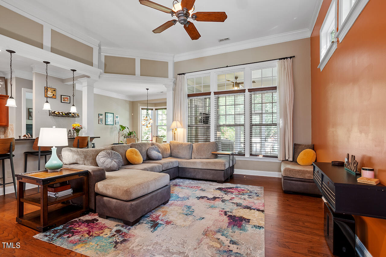 920 Chapanoke Road Raleigh, NC 27603 - Photo 10 of 47 a living room with furniture and a large window