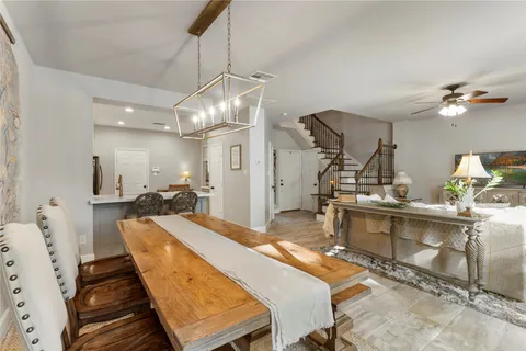 a bed room with a bed mirror and a desk