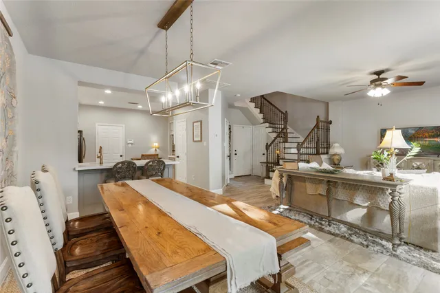 a bed room with a bed mirror and a desk