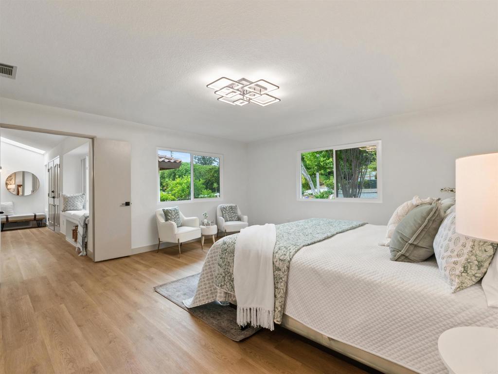 13737 Temple Street Poway, CA 92064 - Photo 17 of 38 a bedroom with a bed and a window