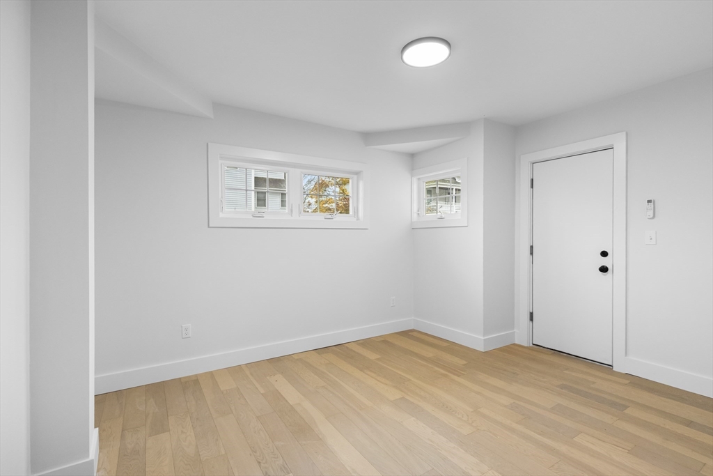 20 Orne Street, Unit B North Attleboro, MA 02760 - Photo 12 of 16 a view of empty room with wooden floor