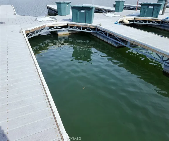 a view of a backyard with a lake view