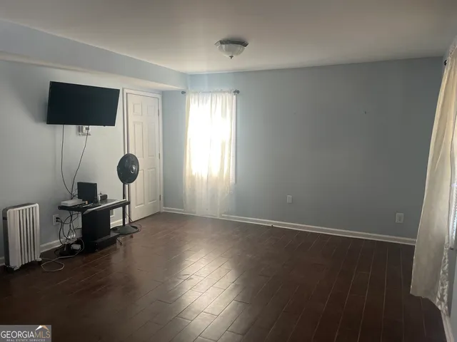 a view of empty room with a window