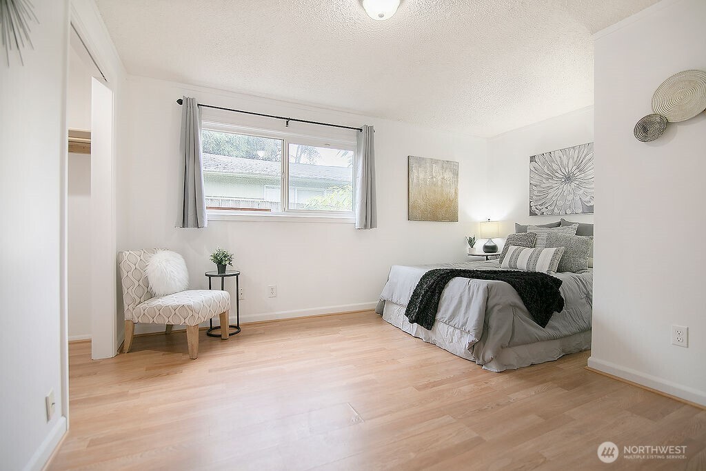 1925 28th Avenue Longview, WA 98632 - Photo 19 of 37 a bedroom with a bed and chair