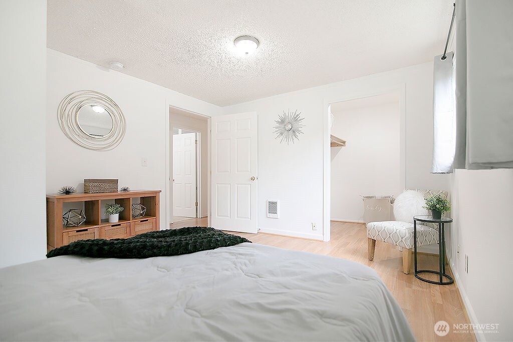 1925 28th Avenue Longview, WA 98632 - Photo 20 of 37 a bedroom with a bed and cabinets