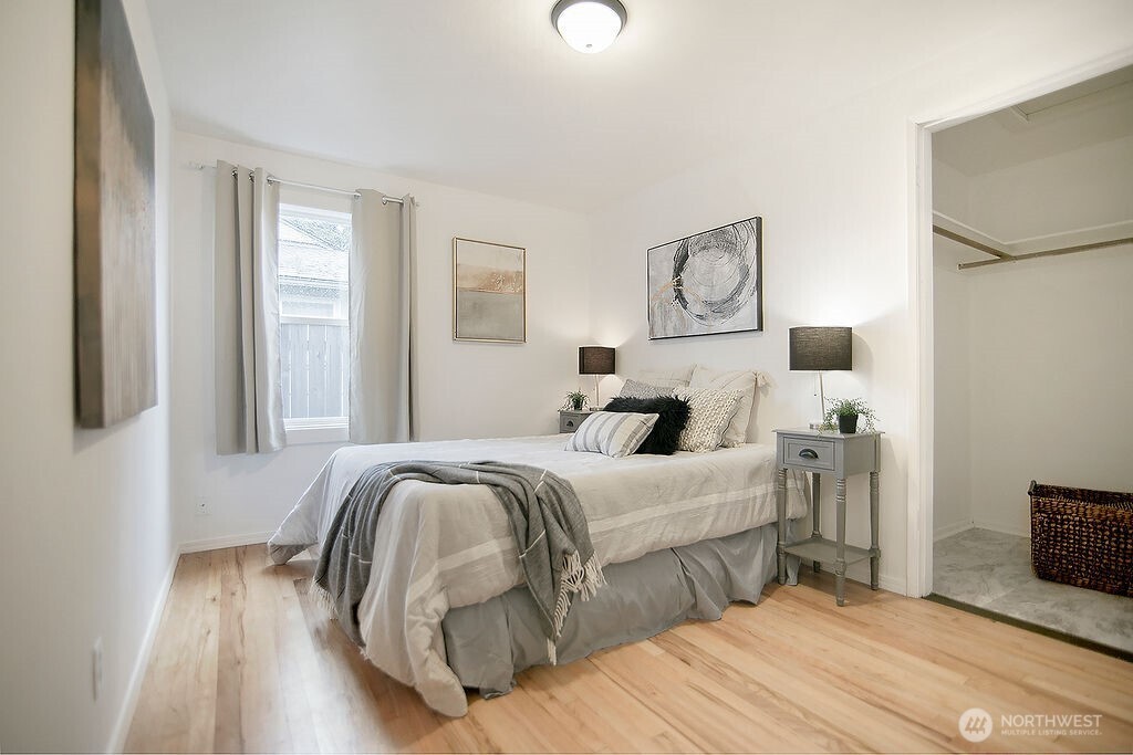 1925 28th Avenue Longview, WA 98632 - Photo 21 of 37 a bedroom with a bed and wooden floor