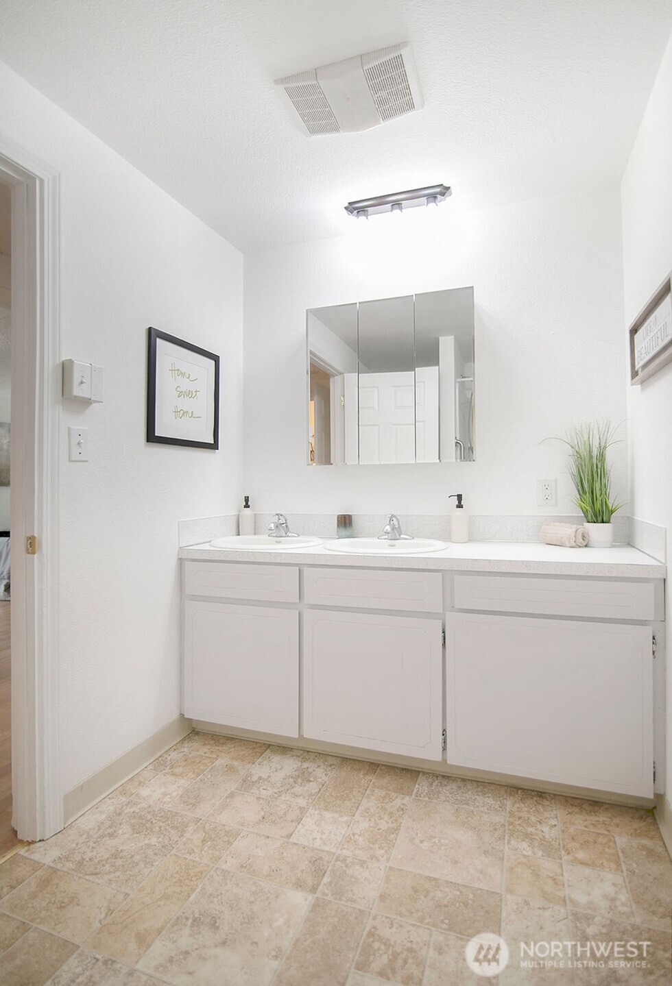 1925 28th Avenue Longview, WA 98632 - Photo 32 of 37 a bathroom with a sink vanity and mirror