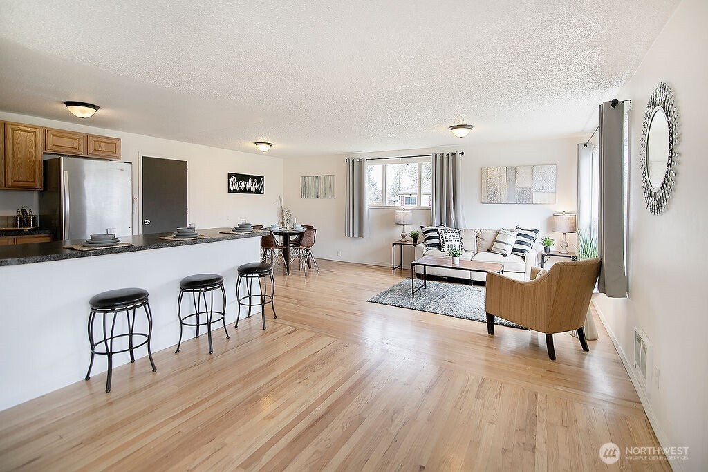 1925 28th Avenue Longview, WA 98632 - Photo 6 of 37 a living room with furniture and a wooden floor