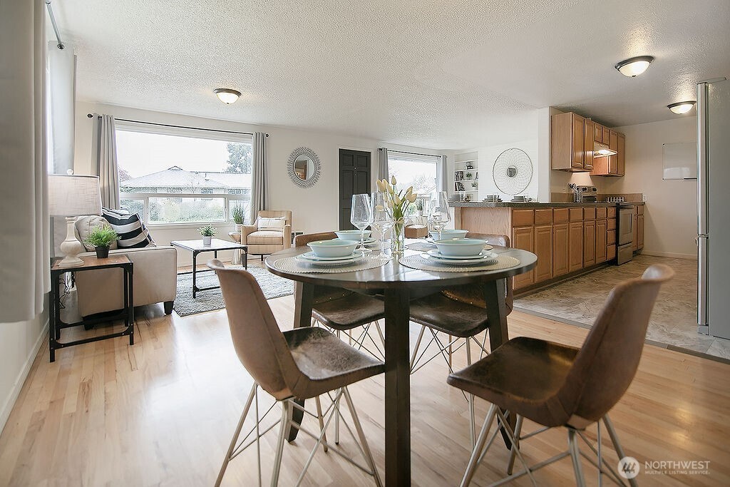 1925 28th Avenue Longview, WA 98632 - Photo 9 of 37 a view of a dining room with furniture and wooden floor