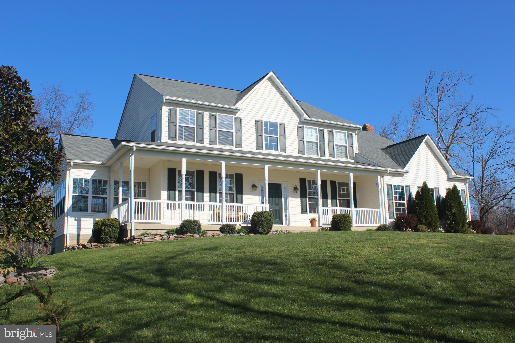 171 Wright Road Winchester, VA 22603 - Photo 1 of 30 a front view of a house with a yard