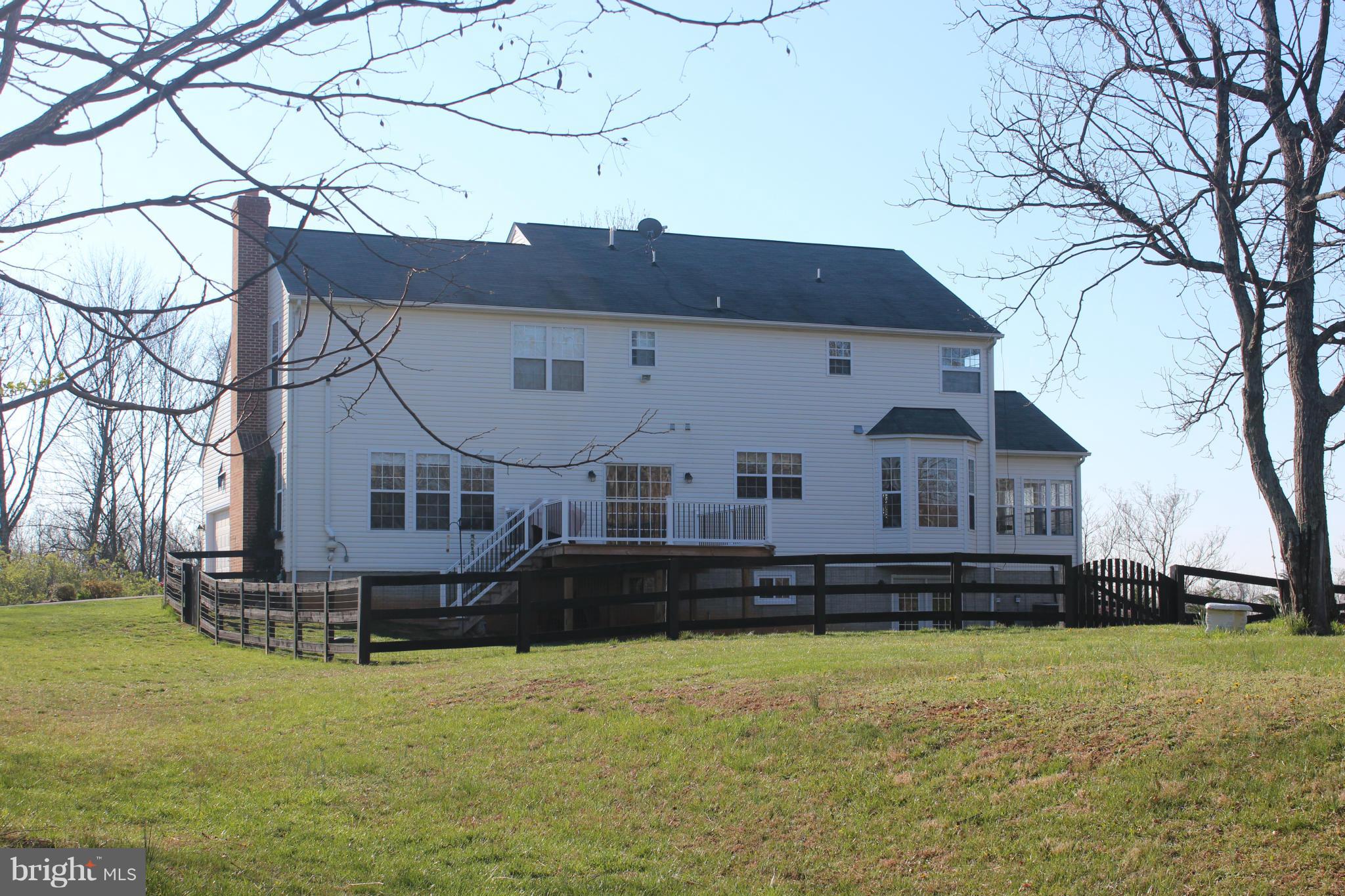 171 Wright Road Winchester, VA 22603 - Photo 2 of 30 a house view with a garden space