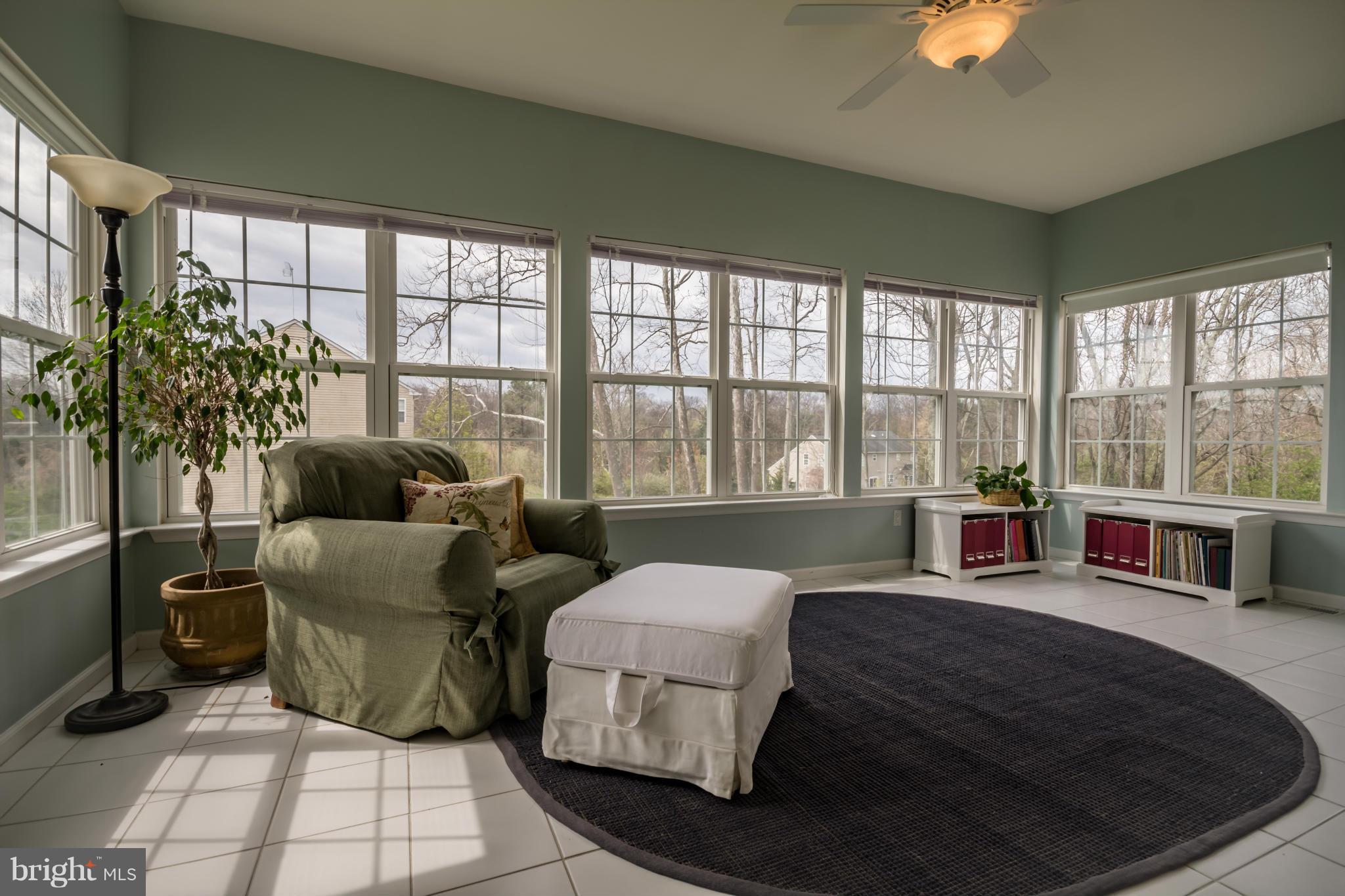 171 Wright Road Winchester, VA 22603 - Photo 12 of 30 a living room with furniture and a floor to ceiling window