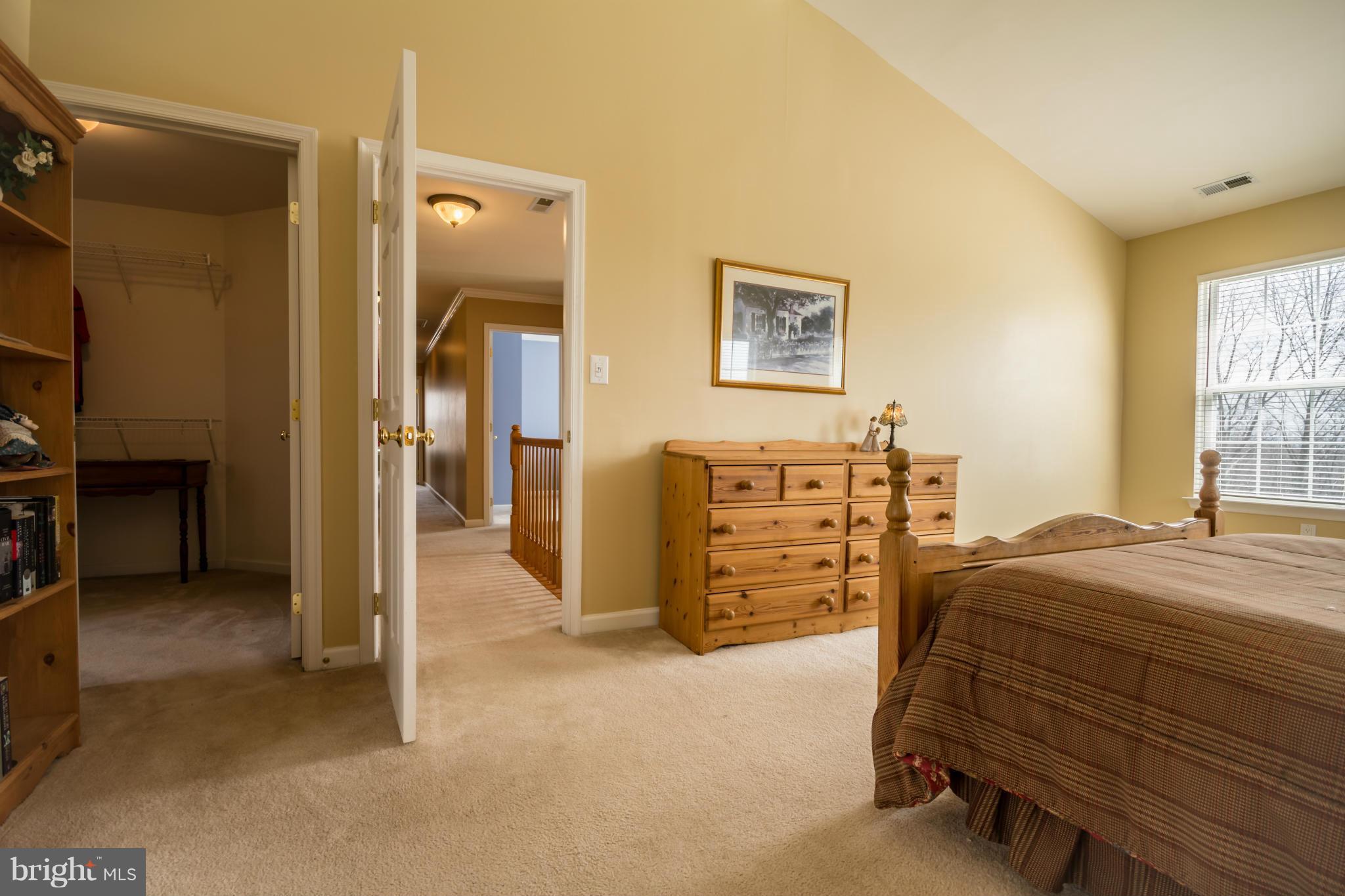 171 Wright Road Winchester, VA 22603 - Photo 18 of 30 a bedroom with a bed and a cabinets