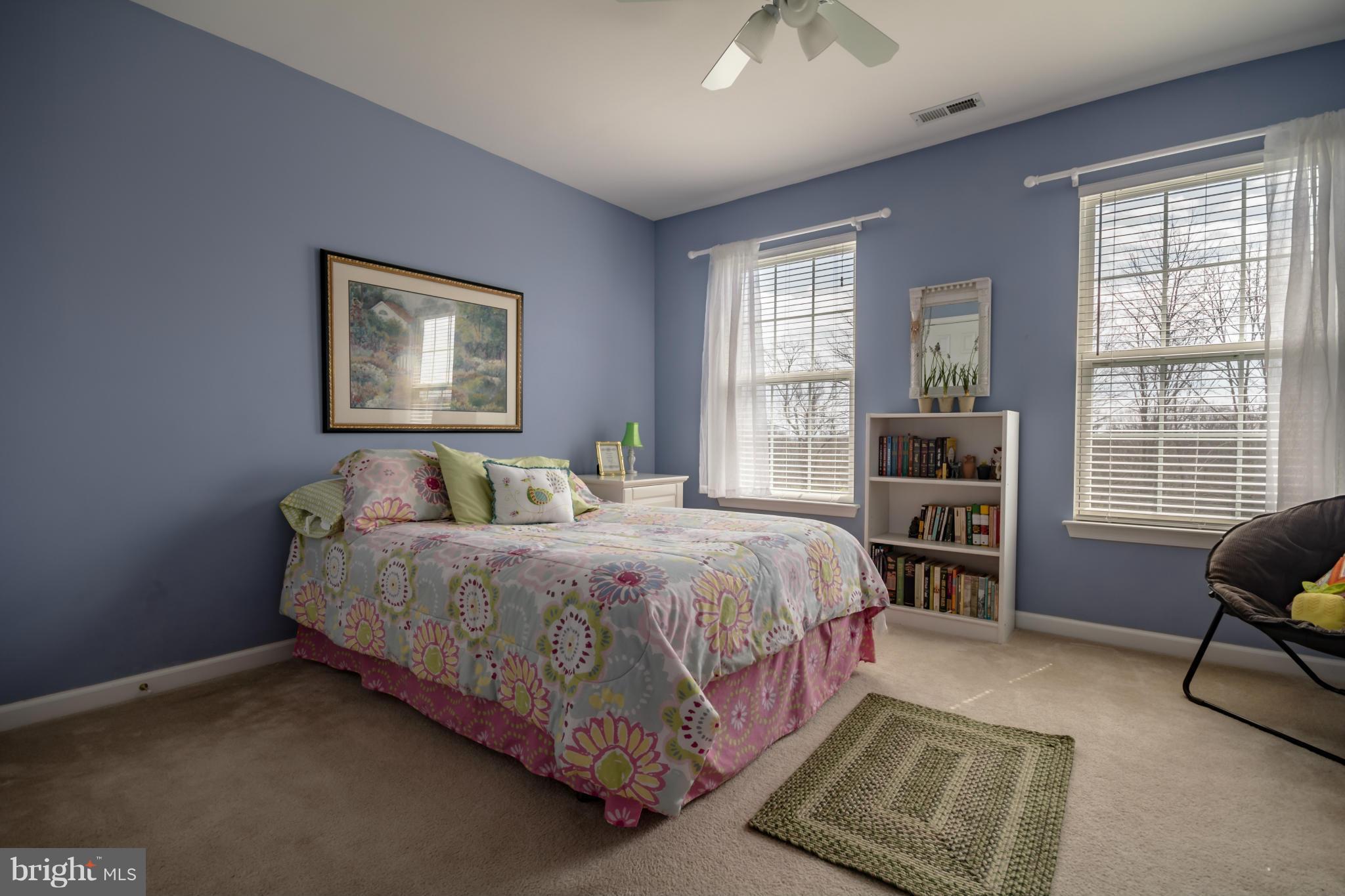 171 Wright Road Winchester, VA 22603 - Photo 21 of 30 a bedroom with a bed couch and a window