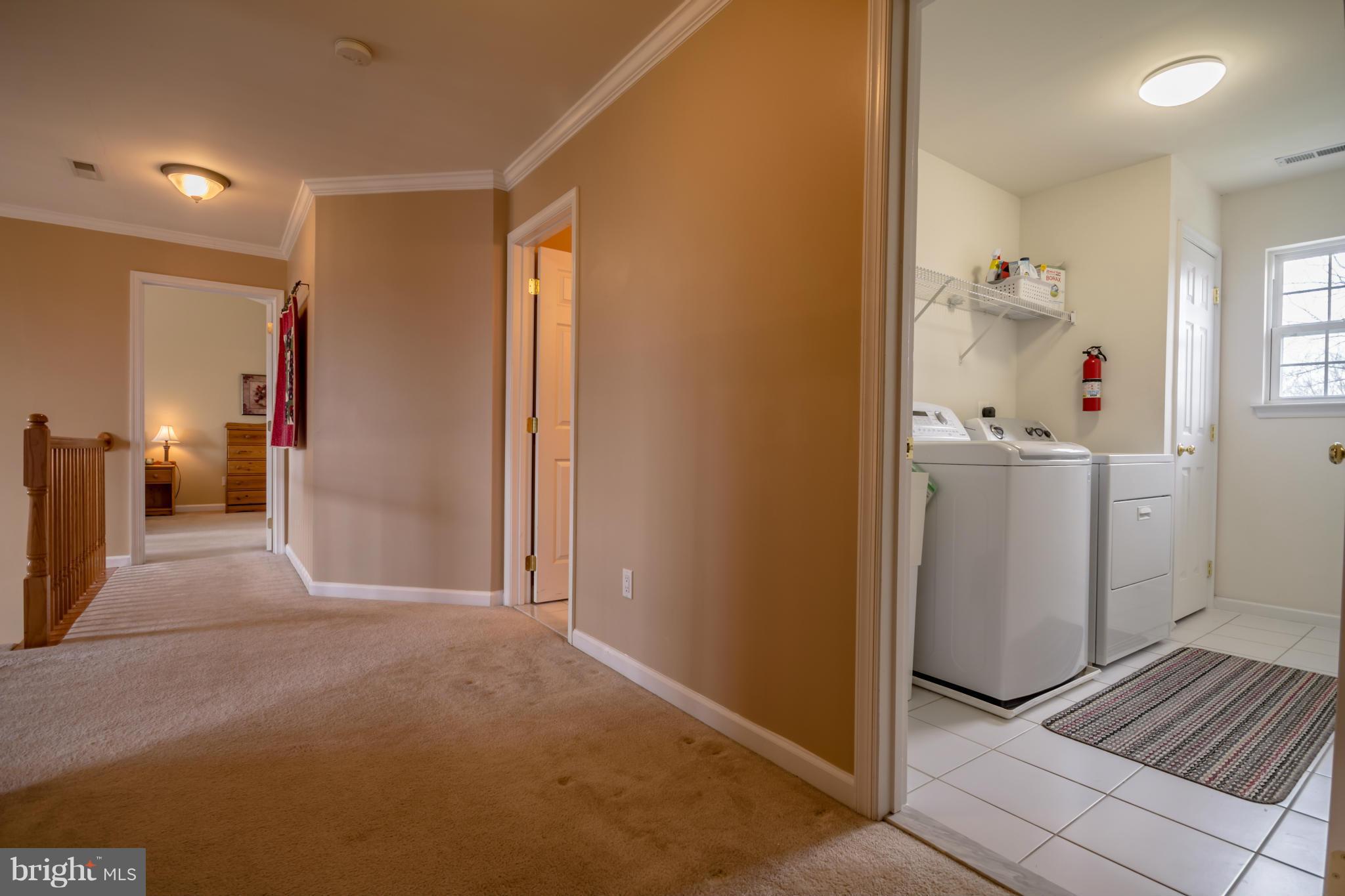 171 Wright Road Winchester, VA 22603 - Photo 25 of 30 a view of hallway with livingroom and stairs