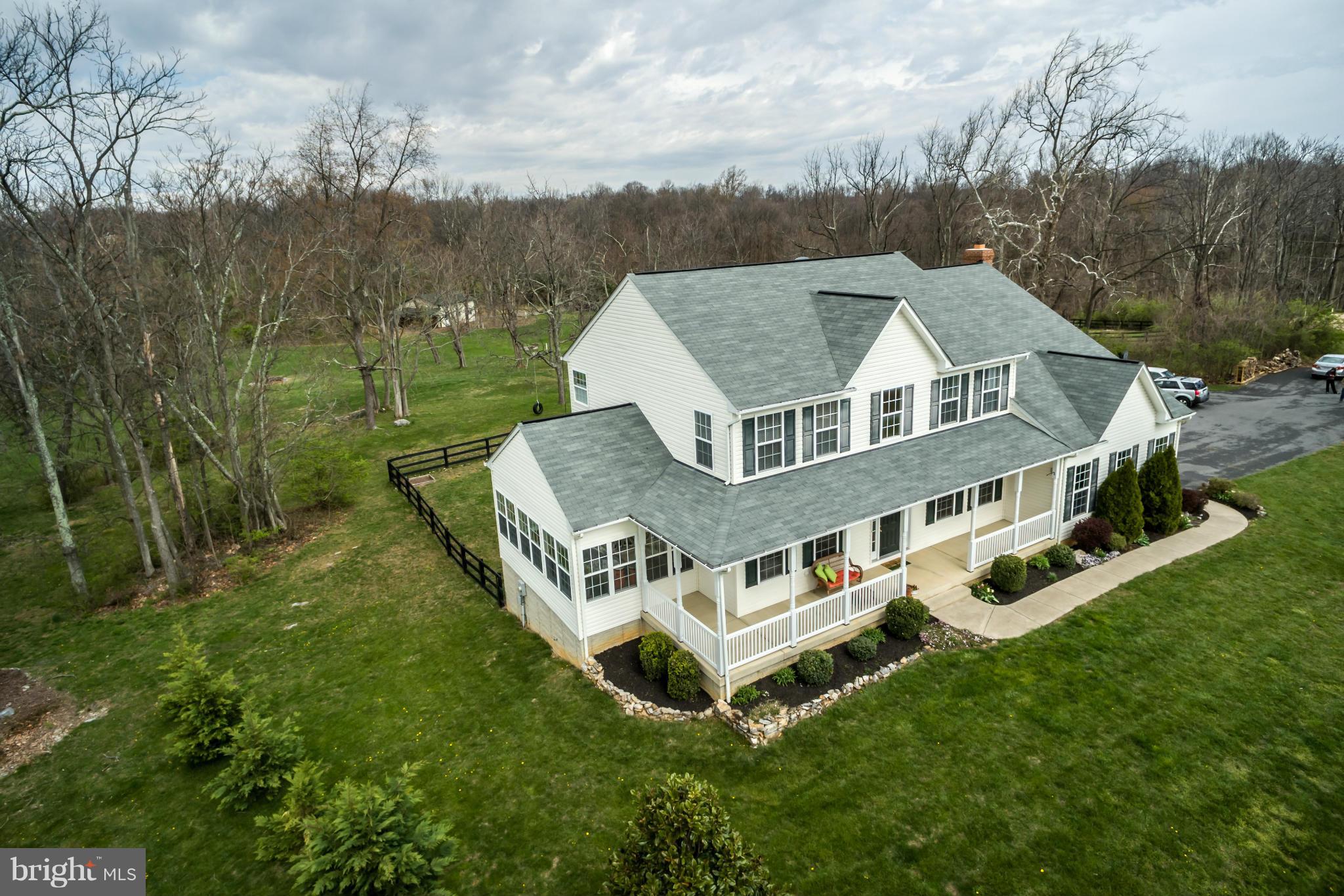 171 Wright Road Winchester, VA 22603 - Photo 28 of 30 a aerial view of white house with a big yard and large trees