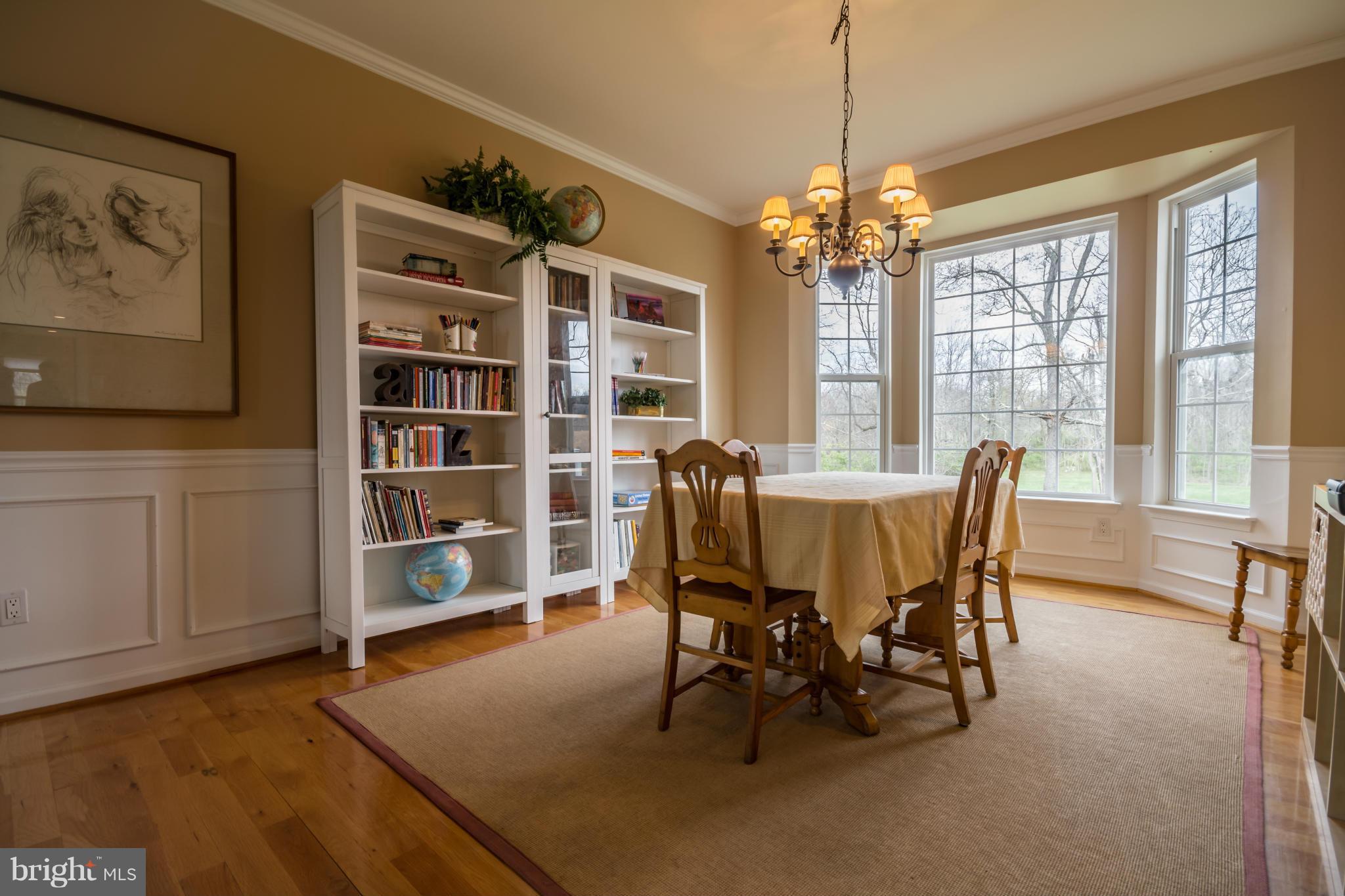 171 Wright Road Winchester, VA 22603 - Photo 8 of 30 a view of a dining room with furniture window and wooden floor