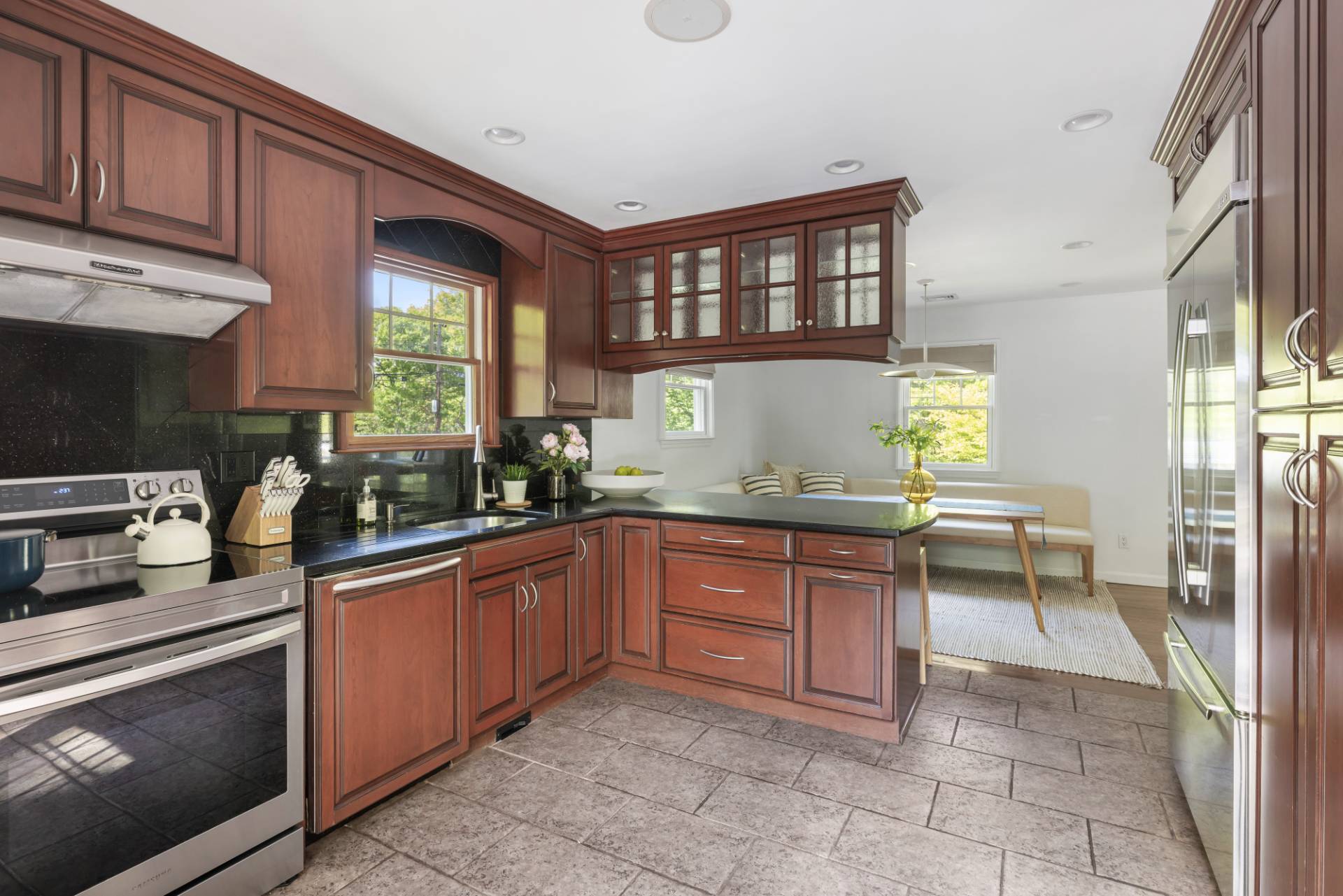 40 Ridge Road West Sag Harbor, NY 11963 - Photo 12 of 27 a kitchen with a sink counter top space appliances and a window