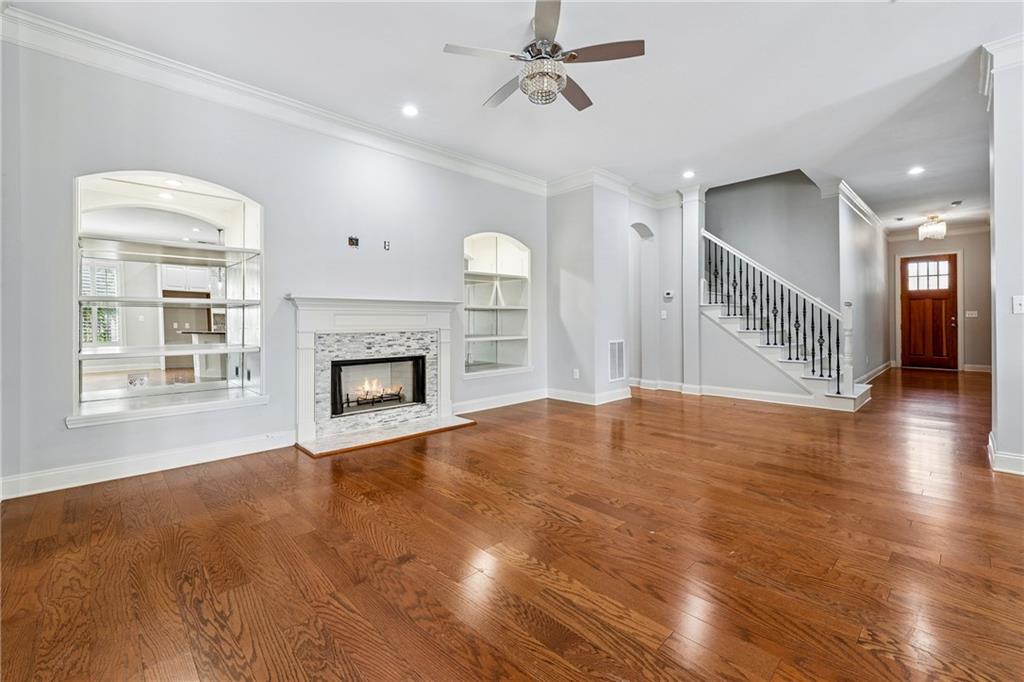 4865 Chase Lane Cumming, GA 30040 - Photo 21 of 70 a view of an empty room with window and fireplace