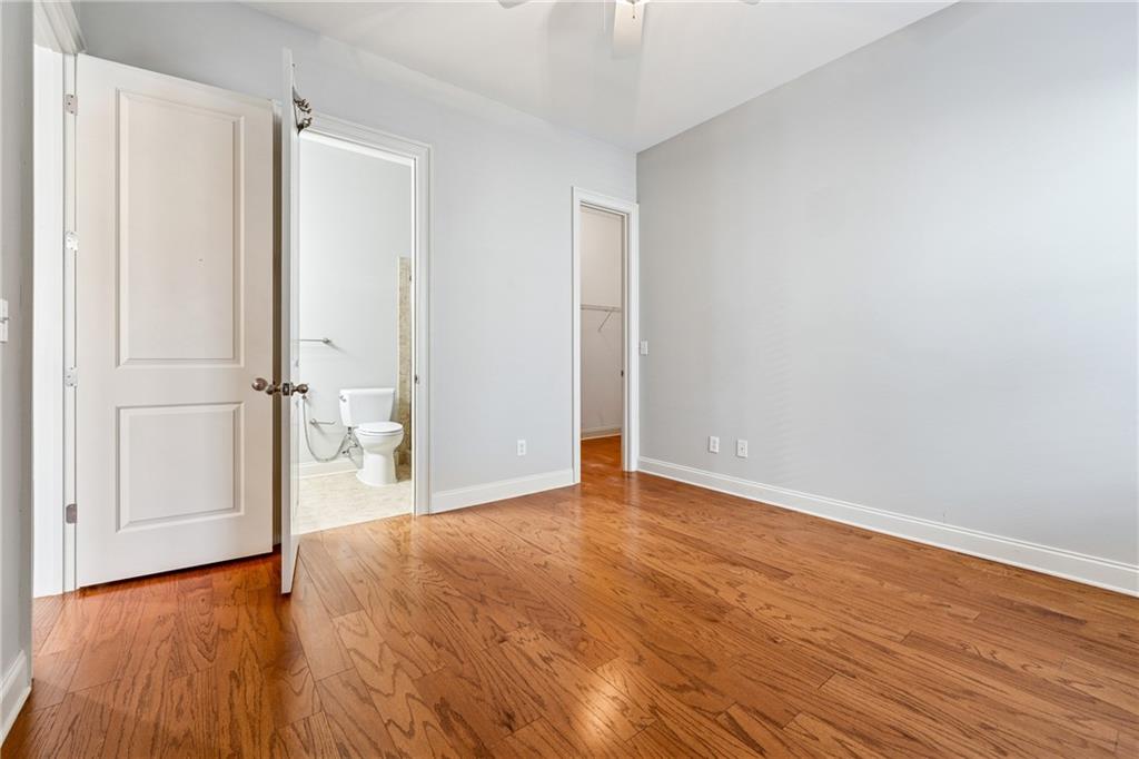 4865 Chase Lane Cumming, GA 30040 - Photo 40 of 70 a view of empty room with wooden floor