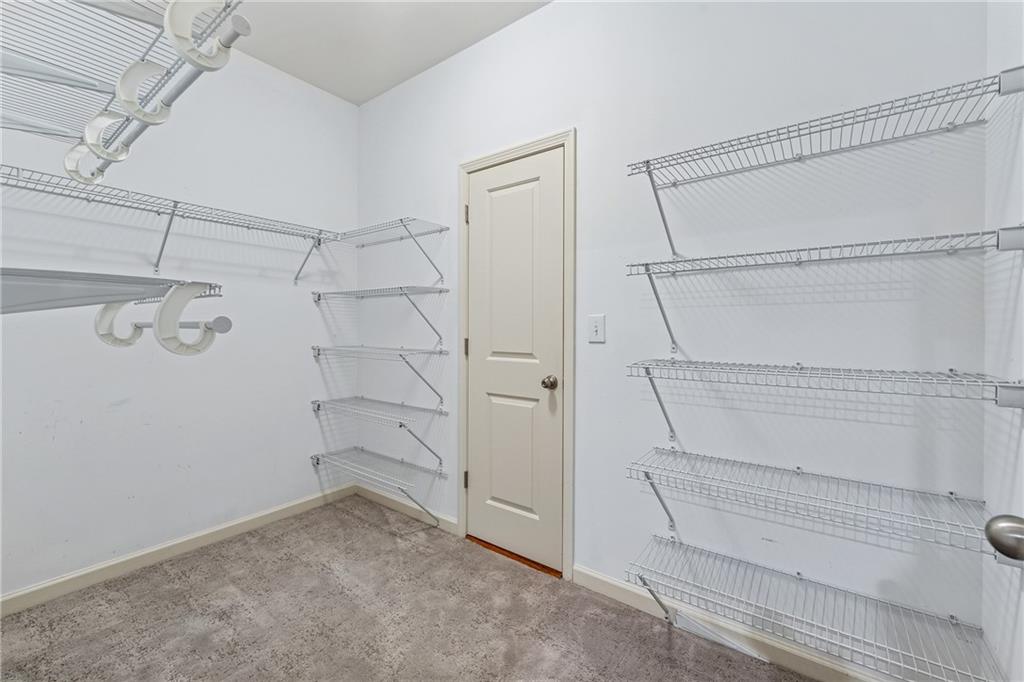 4865 Chase Lane Cumming, GA 30040 - Photo 51 of 70 a view of walk in closet
