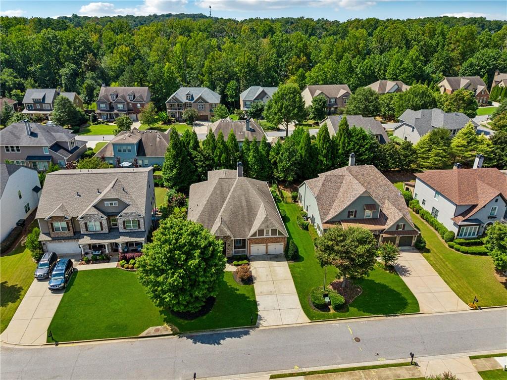 4865 Chase Lane Cumming, GA 30040 - Photo 59 of 70 an aerial view of multiple houses