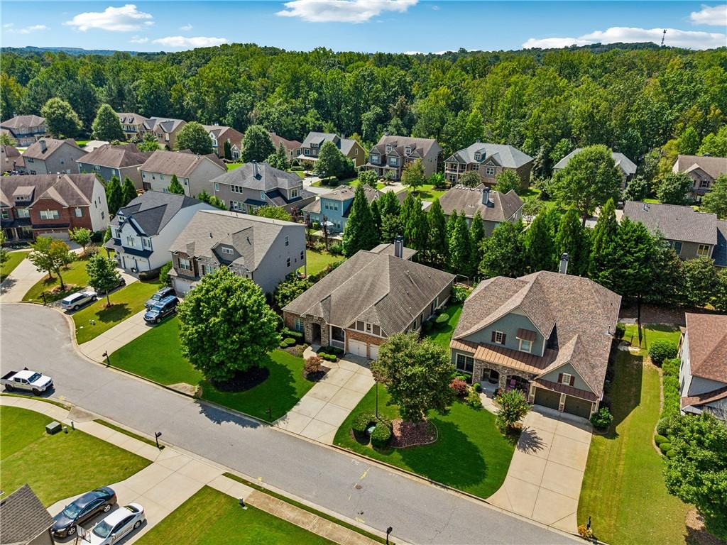 4865 Chase Lane Cumming, GA 30040 - Photo 60 of 70 an aerial view of a house with a garden