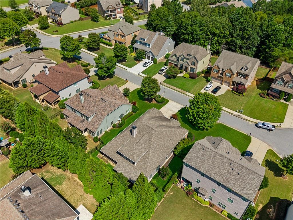 4865 Chase Lane Cumming, GA 30040 - Photo 63 of 70 an aerial view of a house with a garden