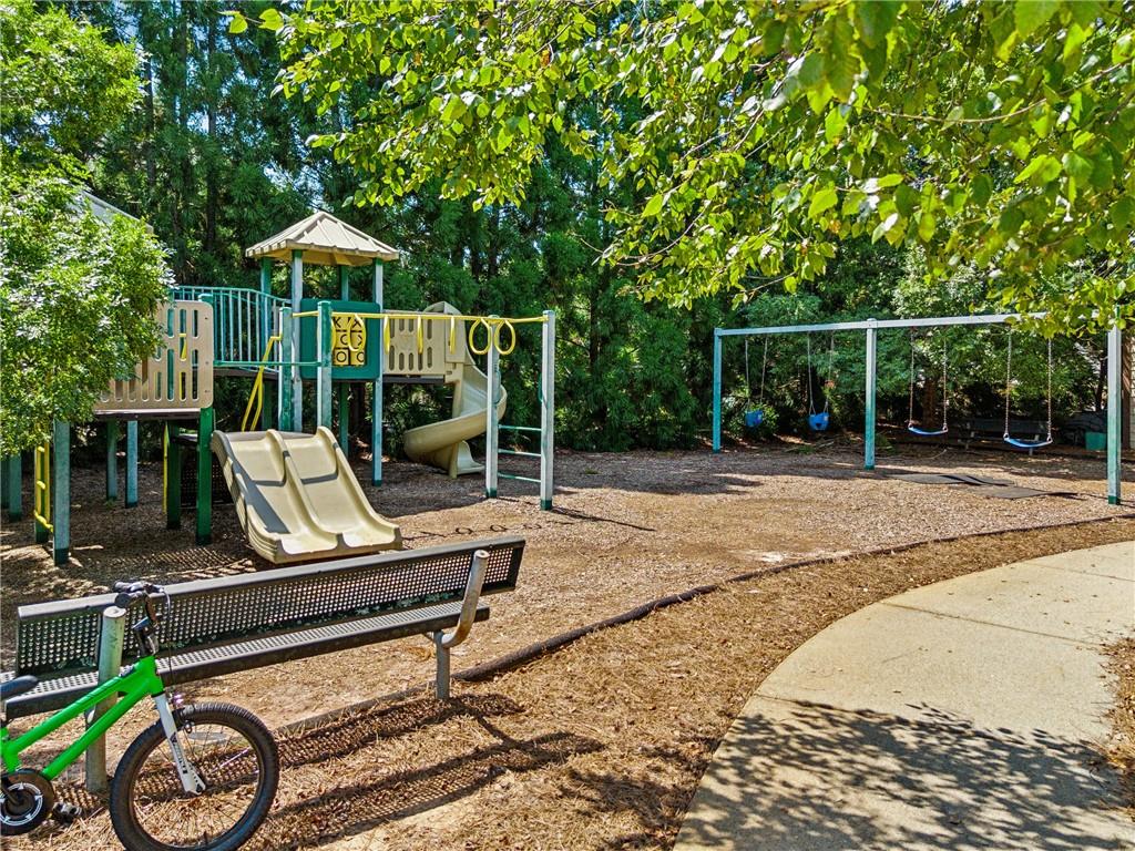 4865 Chase Lane Cumming, GA 30040 - Photo 70 of 70 a garden view with a seating space