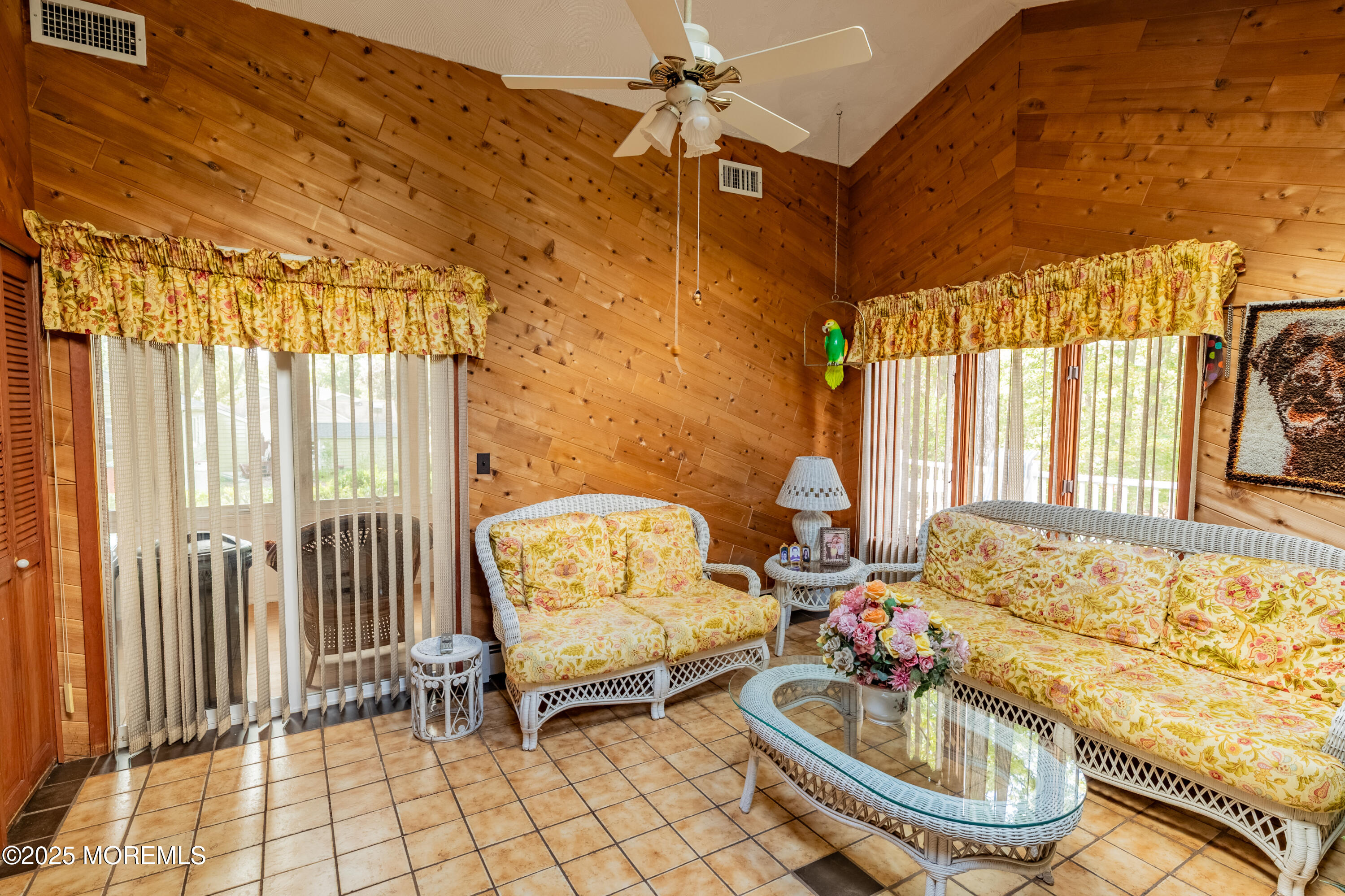 806 West Farms Road Howell, NJ 07731 - Photo 11 of 31 a living room with furniture and a floor to ceiling window