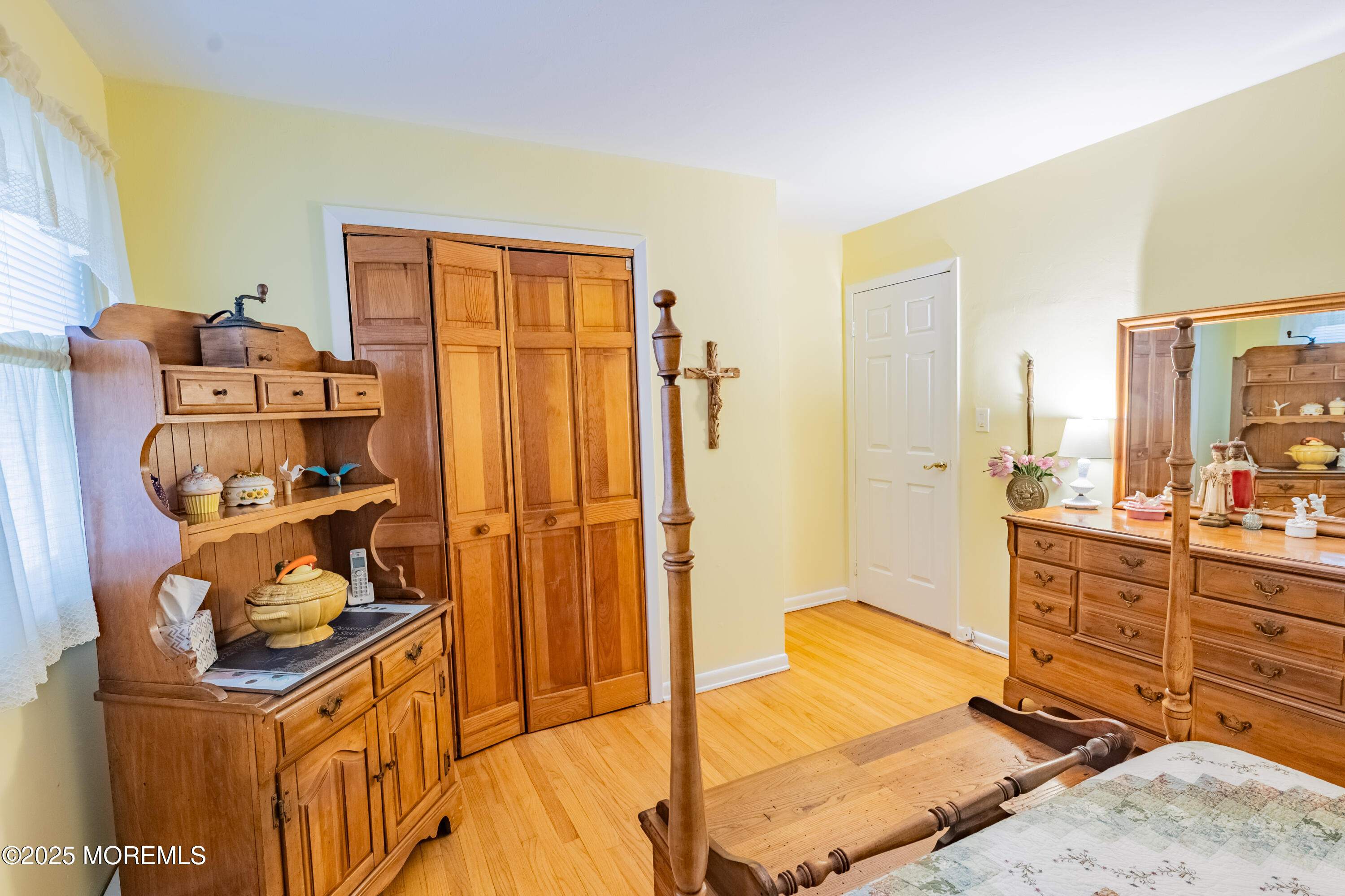 806 West Farms Road Howell, NJ 07731 - Photo 17 of 31 a bedroom with a bed and a cabinets