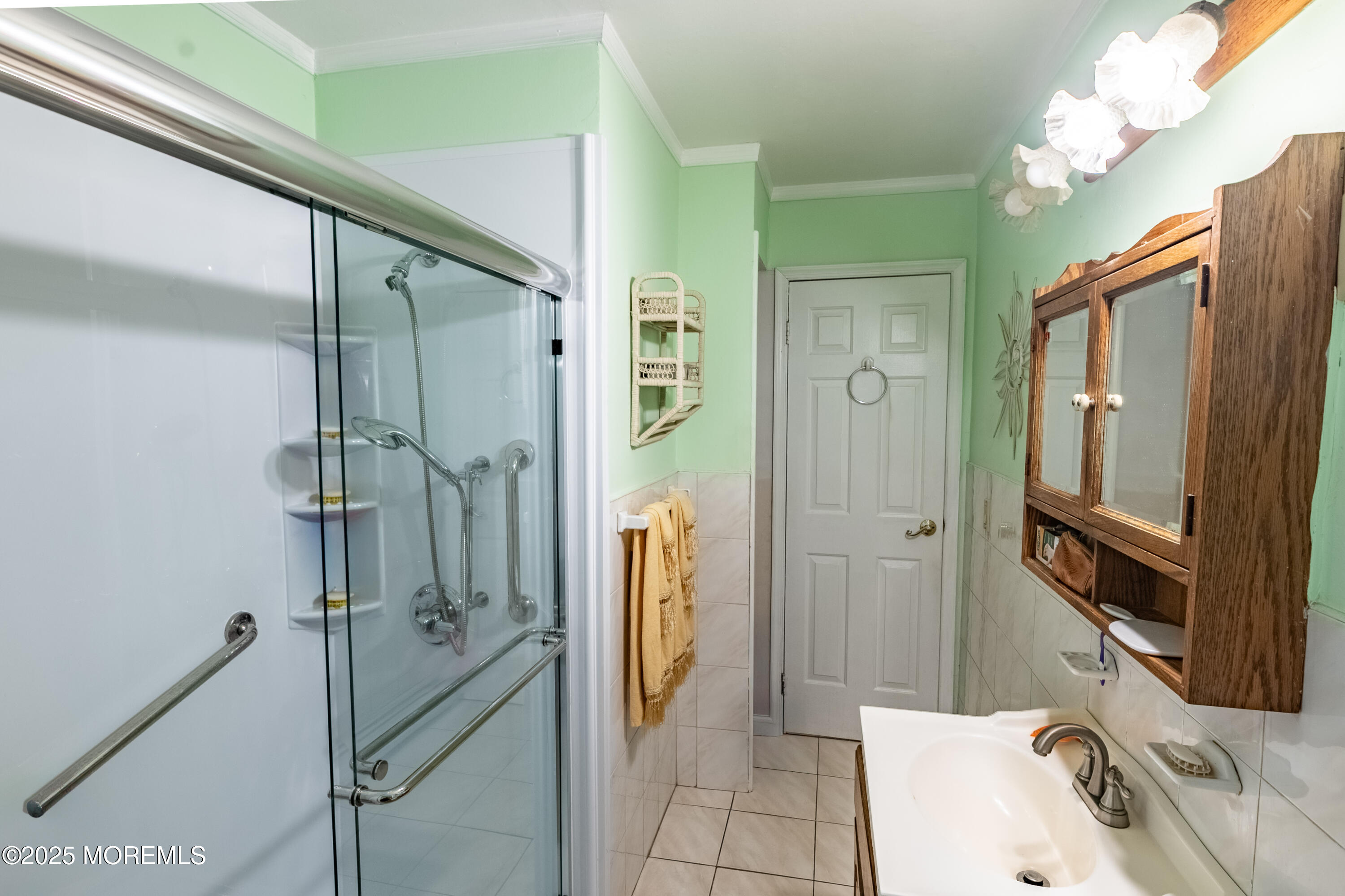 806 West Farms Road Howell, NJ 07731 - Photo 18 of 31 a bathroom with a tub sink and shower