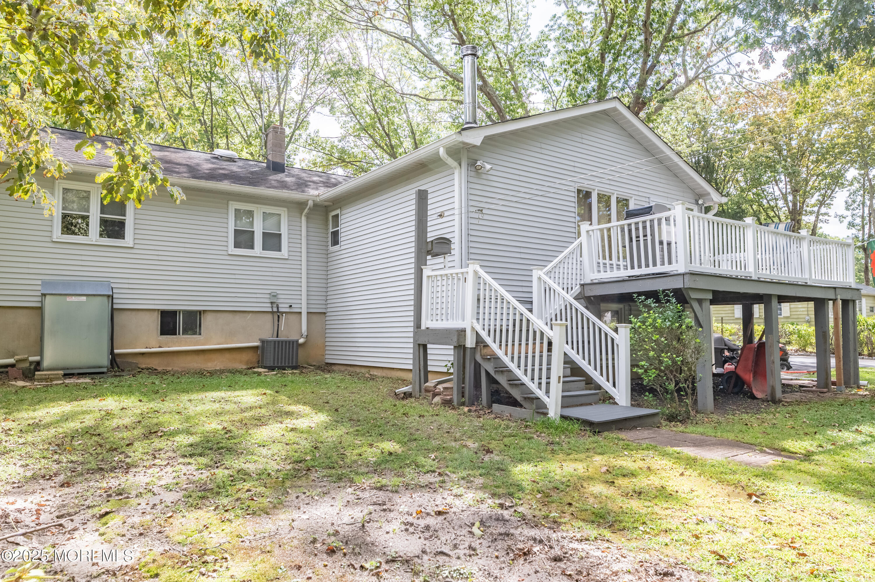 806 West Farms Road Howell, NJ 07731 - Photo 25 of 31 a view of a house with a yard