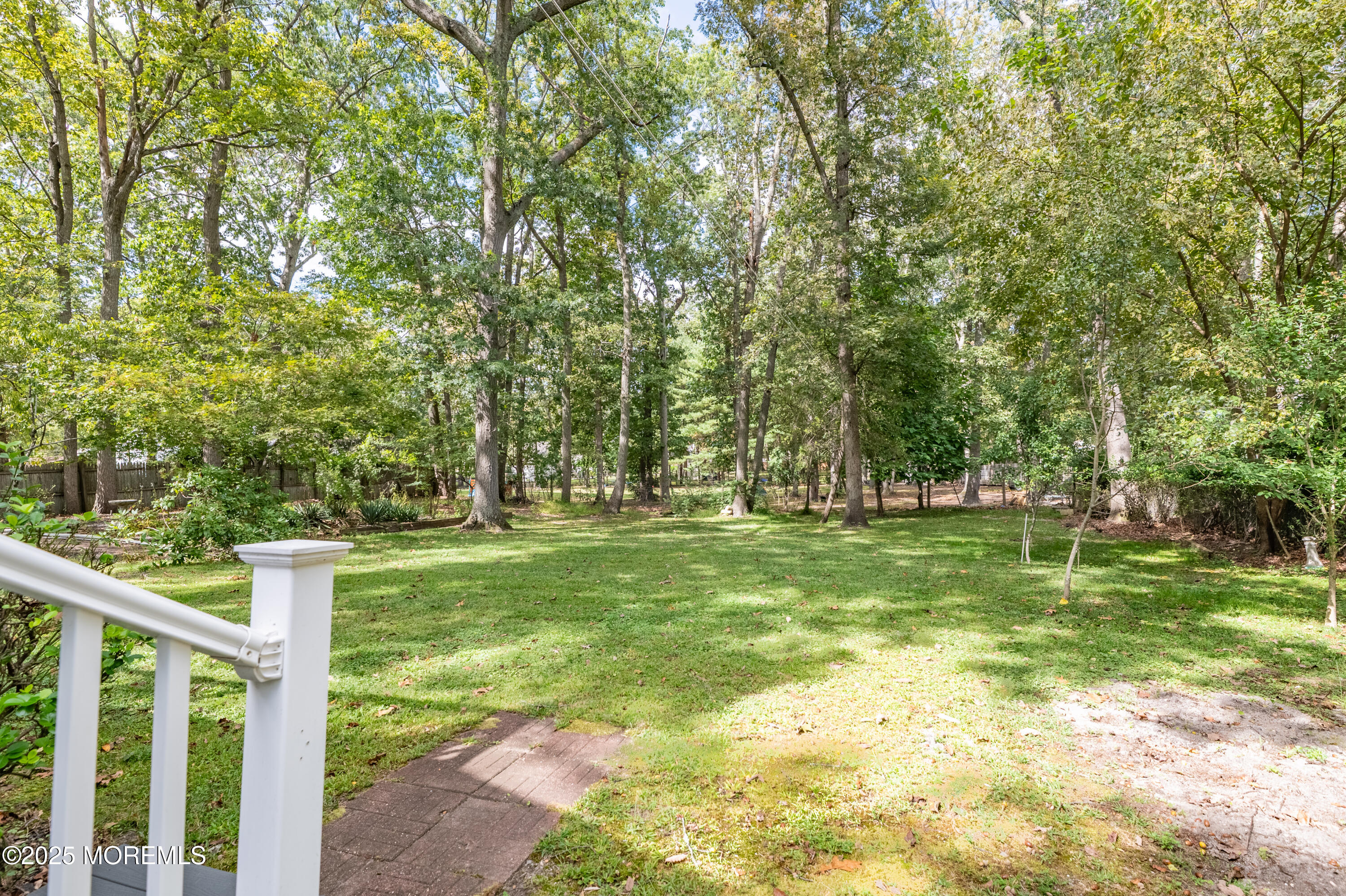 806 West Farms Road Howell, NJ 07731 - Photo 29 of 31 a yard with trees in the background