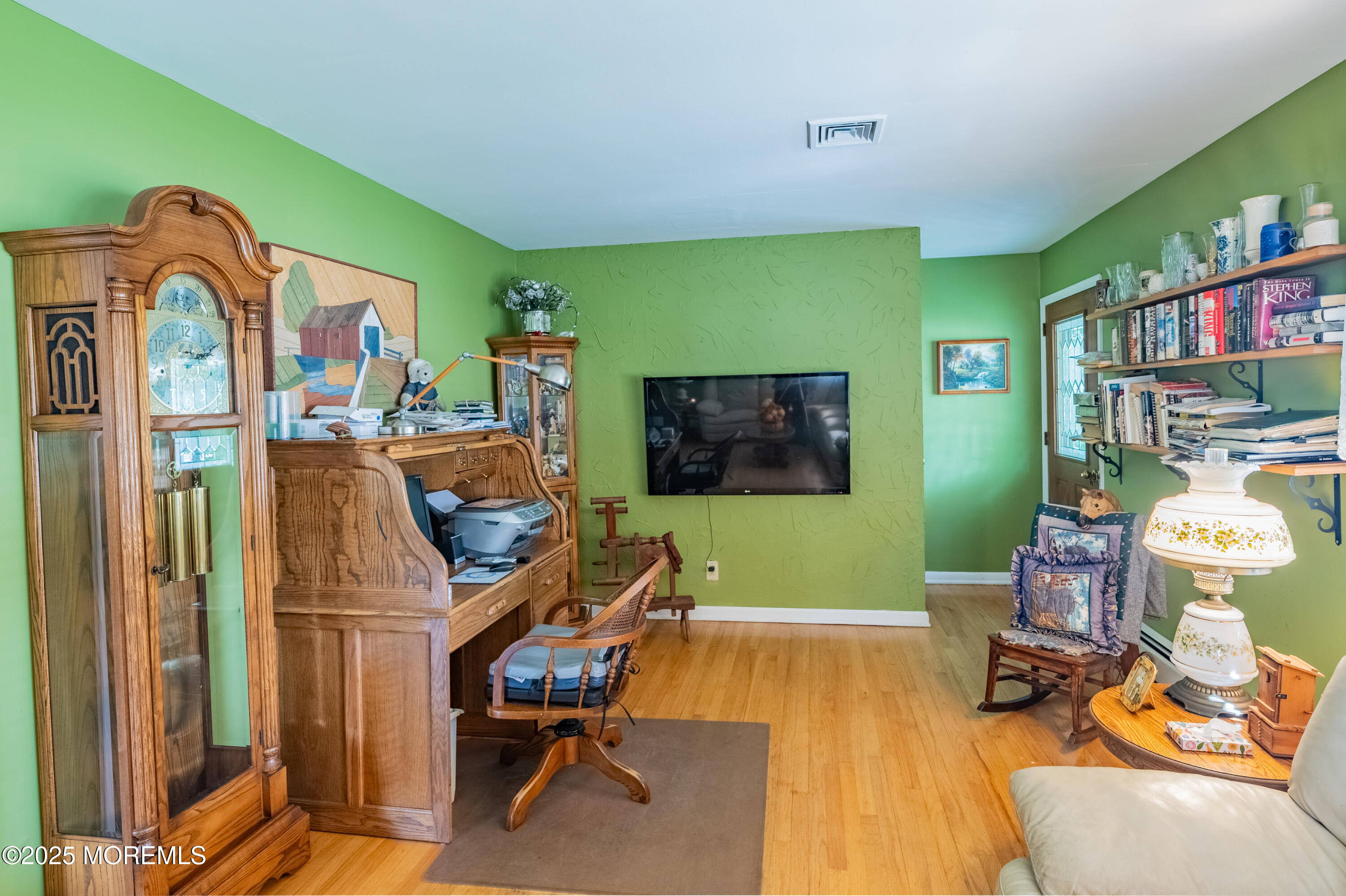806 West Farms Road Howell, NJ 07731 - Photo 4 of 31 a room with furniture and a flat screen tv