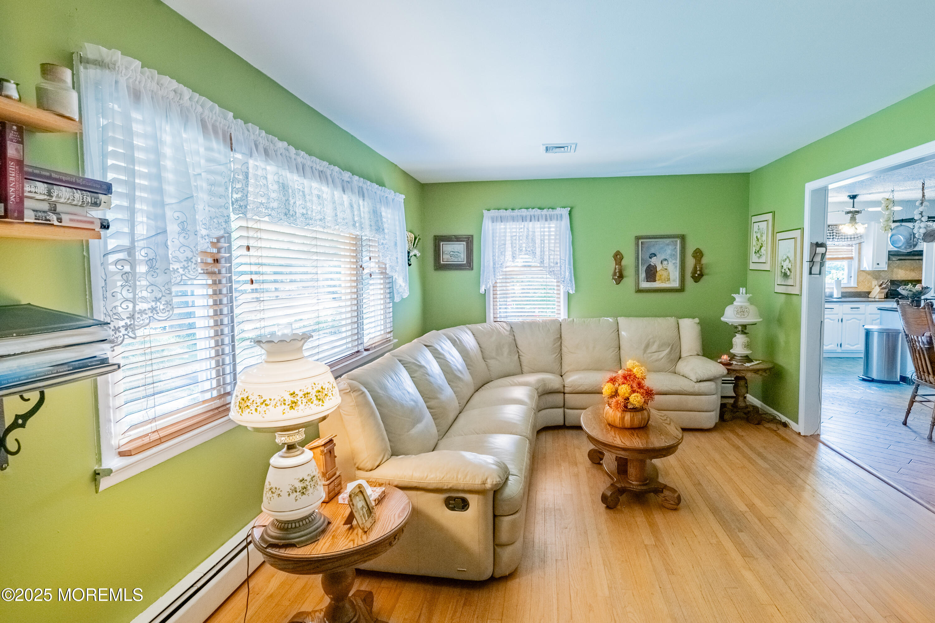 806 West Farms Road Howell, NJ 07731 - Photo 5 of 31 a living room with furniture and a wooden floor