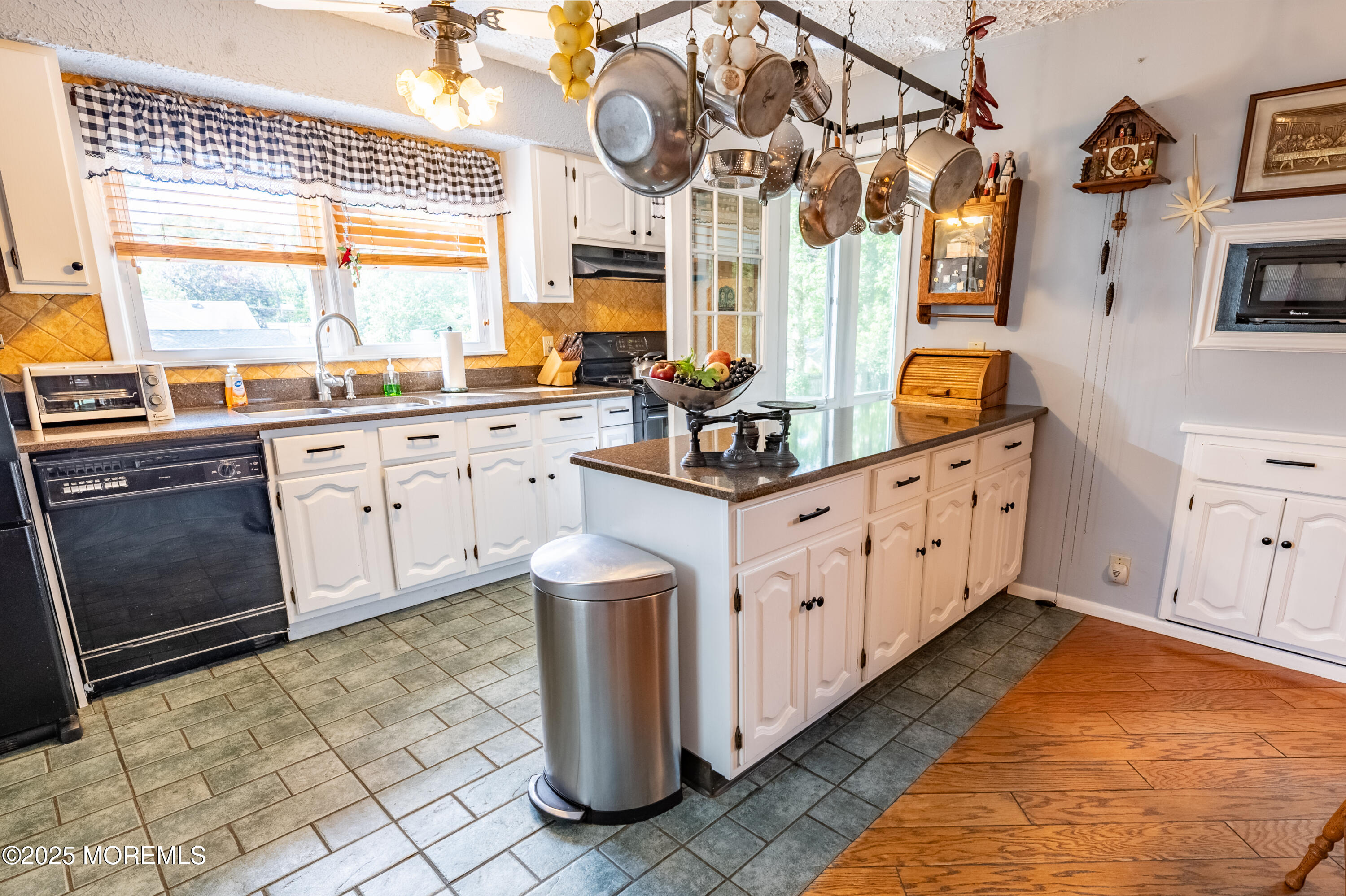 806 West Farms Road Howell, NJ 07731 - Photo 7 of 31 a kitchen with granite countertop a sink and a stove