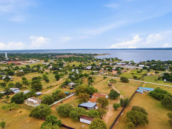an aerial view of residential building and ocean