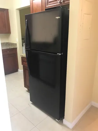 a close view of a refrigerator in kitchen