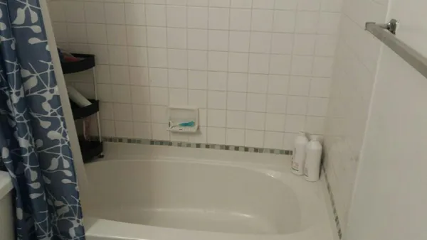 a close up of a bathtub in a bathroom