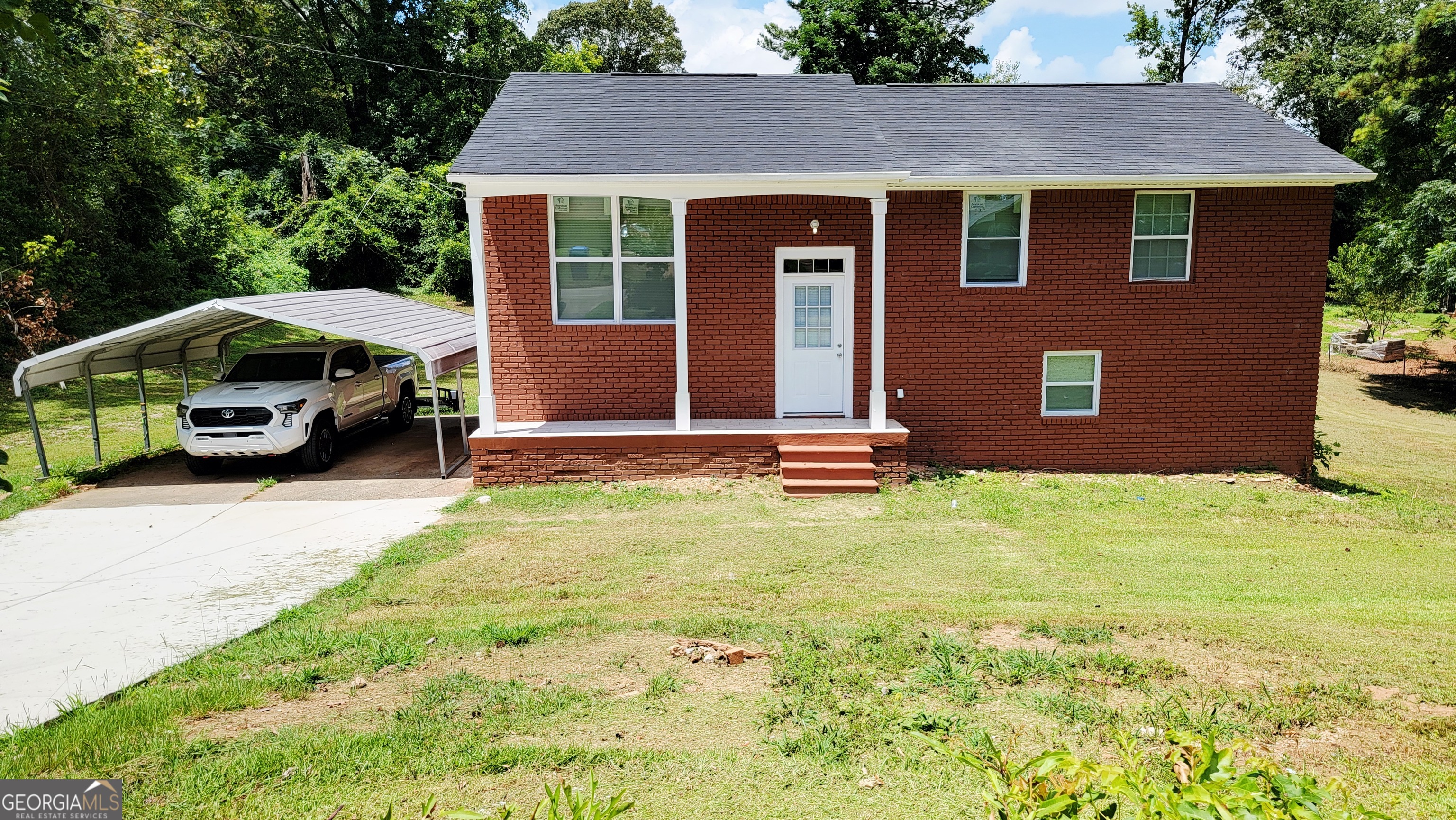 a car parked in front of a house