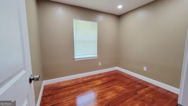 wooden floor and window in a room
