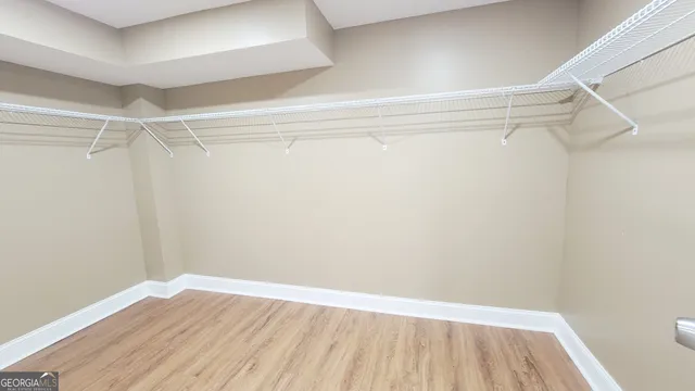 a view of an empty walk in closet